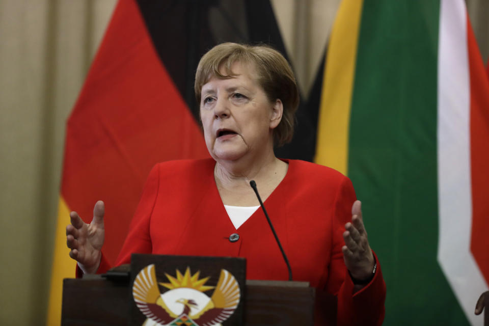 German Chancellor Angela Merkel speaks during a press conference with South African President Cyril Ramaphosa, at the government's Union Buildings in Pretoria, South Africa, Thursday, Feb. 6, 2020. Merkel is in South Africa to discuss trade, investment and energy issues with Berlin's largest trading partner in Africa. (AP Photo/Themba Hadebe)