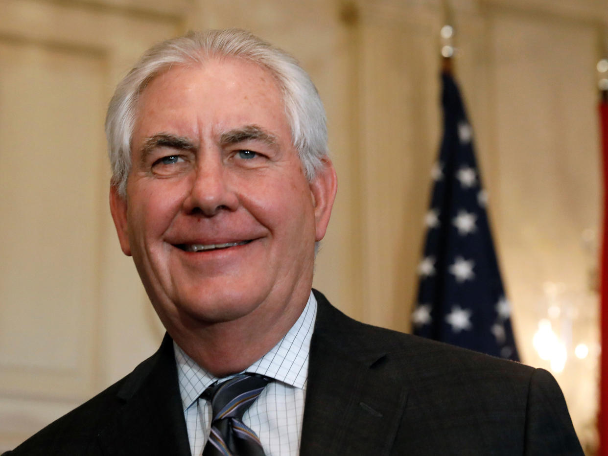 Rex Tillerson and the company he used to run, Exxon Mobil, both want the US to remain in the Paris Agreement: Reuters