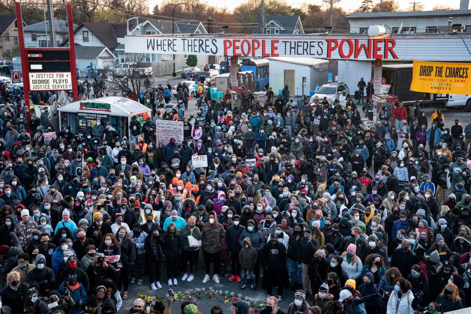 Demonstrators gather outside Cup Foods to celebrate the murder conviction of former Minneapolis police officer Derek Chauvin in the killing of George Floyd, April 20, 2021, in Minneapolis.