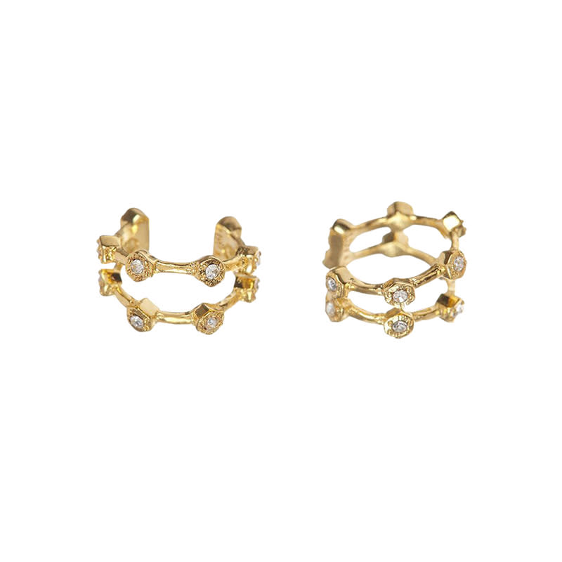 <a rel="nofollow noopener" href="https://www.luvaj.com/collections/ear-cuff/products/pave-hex-ear-cuff-gold" target="_blank" data-ylk="slk:Pave Hex Ear Cuff, Luv Aj, $40;elm:context_link;itc:0;sec:content-canvas" class="link ">Pave Hex Ear Cuff, Luv Aj, $40</a>