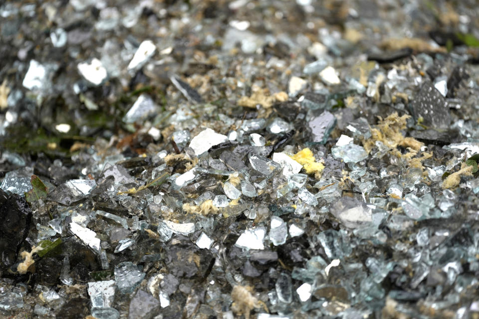 Glass debris from windows blown out of damaged buildings downtown on Friday, May 17, 2024, in Houston, after a strong thunderstorm moved through Thursday evening. (Karen Warren/Houston Chronicle via AP)