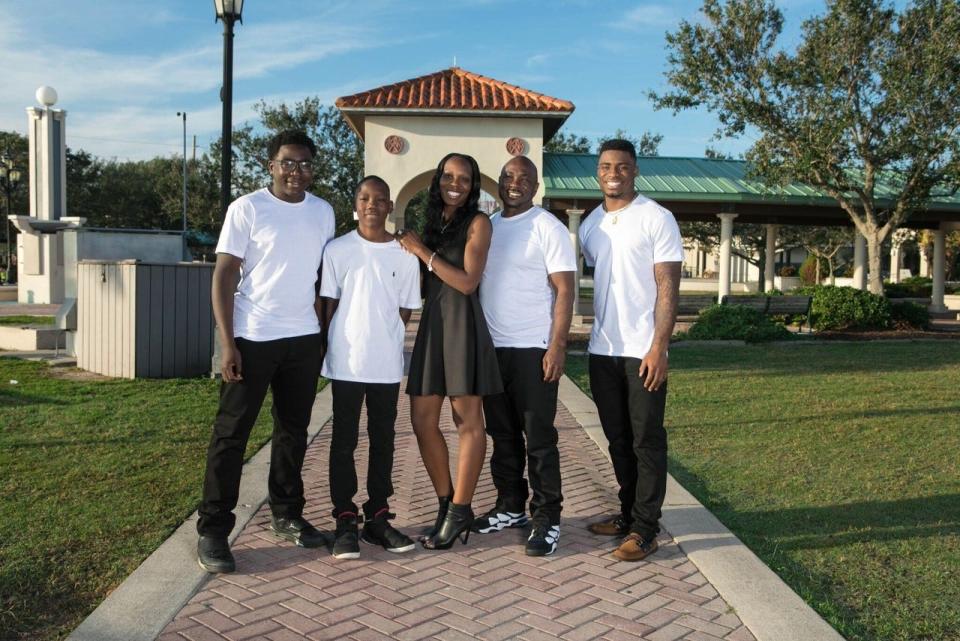 Lions defensive back C.J. Gardner-Johnson, right, and (from left) his brothers Brandon and Byron, mother, Del, and father, Brian.