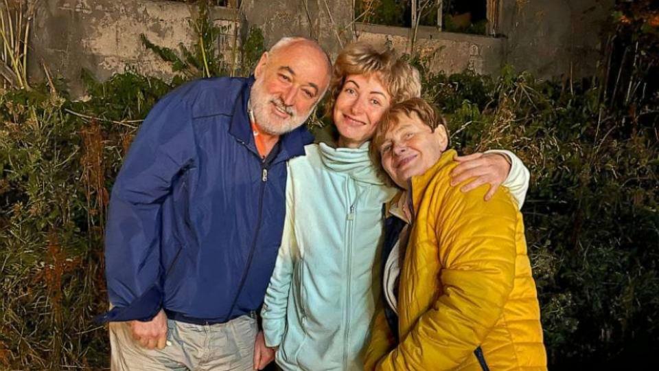 PHOTO: Tatiana Kumok, center, and her parents in Georgia after leaving occupied Ukraine in September 2022. (Tatiana Kumok)