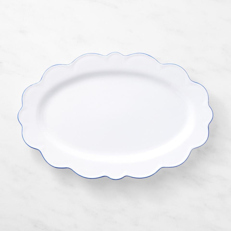 <p><a href="https://go.redirectingat.com?id=74968X1596630&url=https%3A%2F%2Fwww.williams-sonoma.com%2Fproducts%2Faerin-garden-bouquet-blue-scalloped-platter&sref=https%3A%2F%2Fwww.elledecor.com%2Fshopping%2Fa60344572%2Faerin-lauder-williams-sonoma%2F" rel="nofollow noopener" target="_blank" data-ylk="slk:Shop Now;elm:context_link;itc:0;sec:content-canvas" class="link ">Shop Now</a></p><p>AERIN Garden Bouquet Blue Scalloped Platter</p><p>williams-sonoma.com</p><p>$59.95</p>