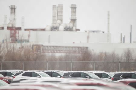 The General Motors CAMI car assembly plant sits behind rows of new GMC Terrain and Chevrolet Equinox, in Ingersoll, Ontario, Canada, January 27, 2017. REUTERS/Geoff Robins