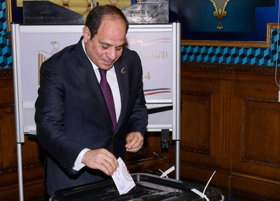 PHOTO: A handout picture released by the Egyptian Presidency on Dec. 10, 2023, shows Egyptian President Abdel Fattah al-Sisi casting his vote in the presidential election at Mustafa Yousry Emmera School in Cairo. (Egyptian Presidency/AFP via Getty Images)