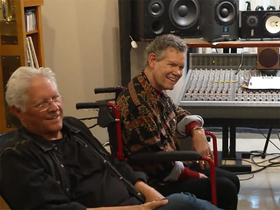 Singer Randy Travis (right), with his longtime record producer Kyle Lehning. They've collaborated on a new song - Travis' first single since he suffered a stroke in 2013.  / Credit: CBS News