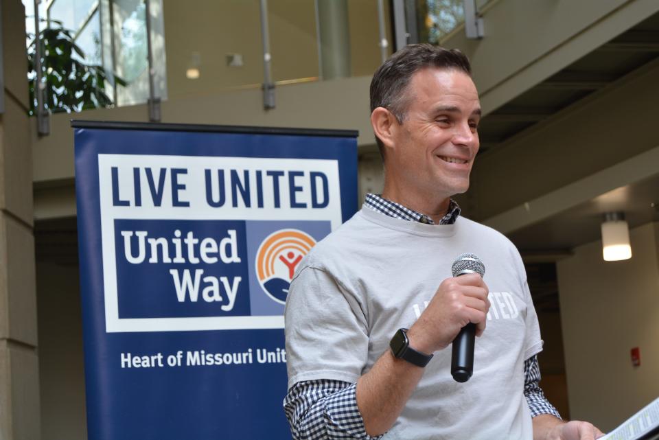 Andrew Grabau, Heart of Missouri United Way president and CEO, welcomes Give 5 program graduates, the agencies they were paired with and other guests to the program's graduation celebration Thursday.