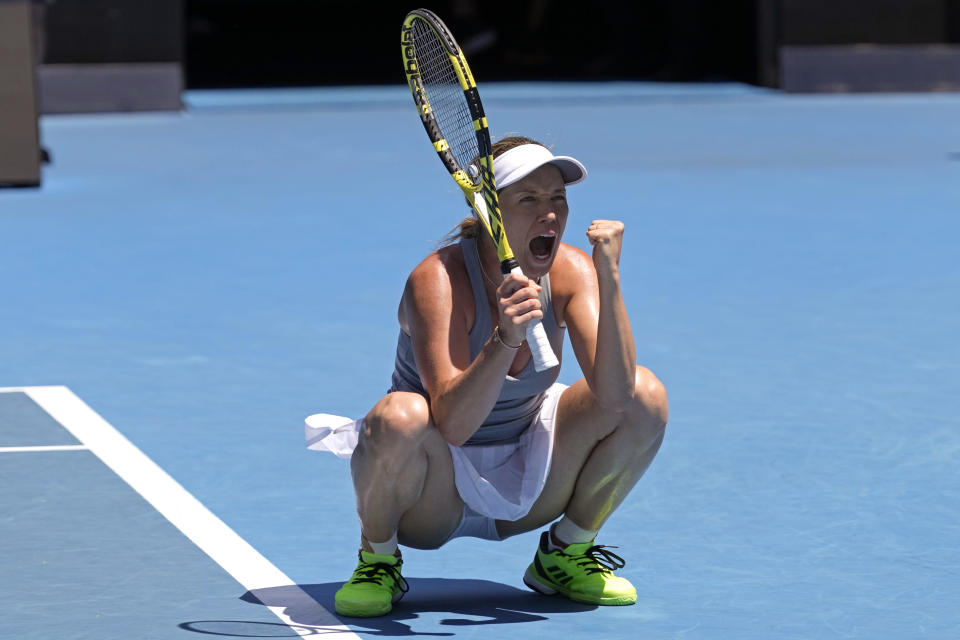 Danielle Collins of the U.S. reacts after defeating Alize Cornet of France in their quarterfinal match at the Australian Open tennis championships in Melbourne, Australia, Wednesday, Jan. 26, 2022. (AP Photo/Simon Baker)