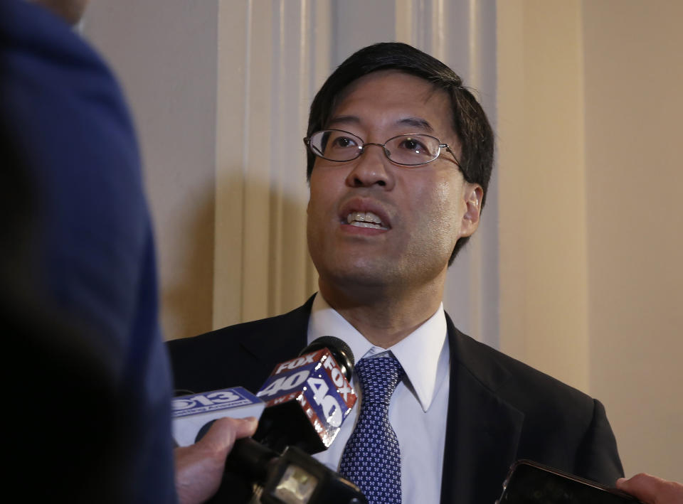 State Sen. Richard Pan, D-Sacramento, talks to reporters after Gov. Gavin Newsom signed his bill to tighten the rules on giving exemptions for vaccinations, at the Capitol in Sacramento, Calif., Monday, Sept. 9, 2019. (AP Photo/Rich Pedroncelli)