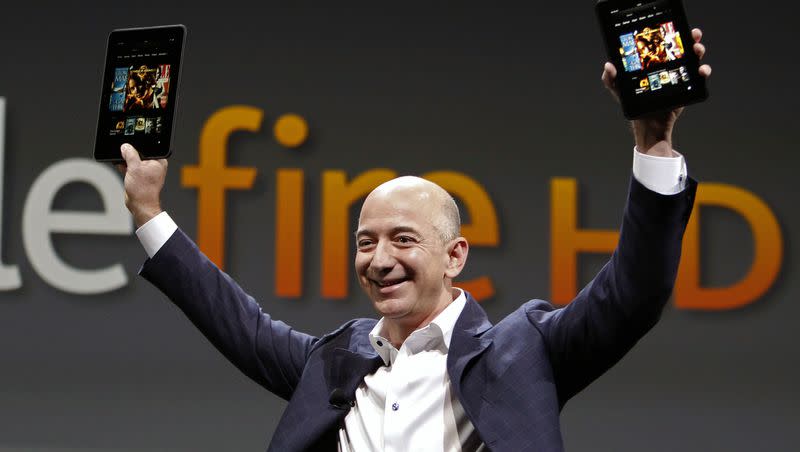 Jeff Bezos, CEO and founder of Amazon, holds the new Amazon Kindle Fire HD at the product’s introduction in Santa Monica, Calif., on Sept. 6, 2012.