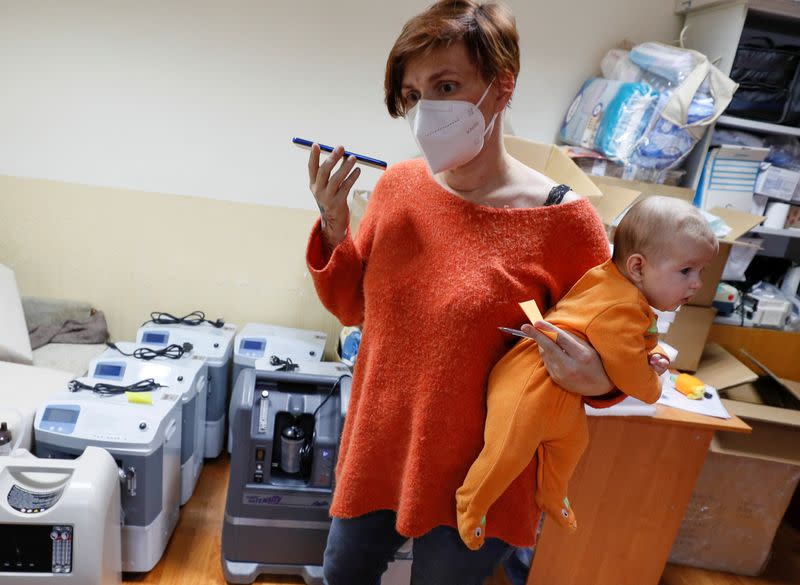 Charity co-founder Lesya Lytvynova works in her office in Kyiv