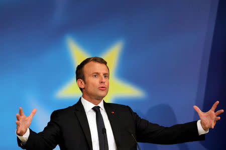 FILE PHOTO: French President Emmanuel Macron delivers a speech to set out plans for reforming the European Union at the Sorbonne in Paris, France, September 26, 2017. REUTERS/Ludovic Marin/Pool/File Photo