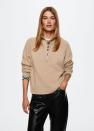 <p>mango.com</p><p><strong>$59.99</strong></p><p>Now, here's a half-zip sweater that feels v office-appropriate. It also makes for a great layering piece, so feel free to get a little creative with your outfit.</p>