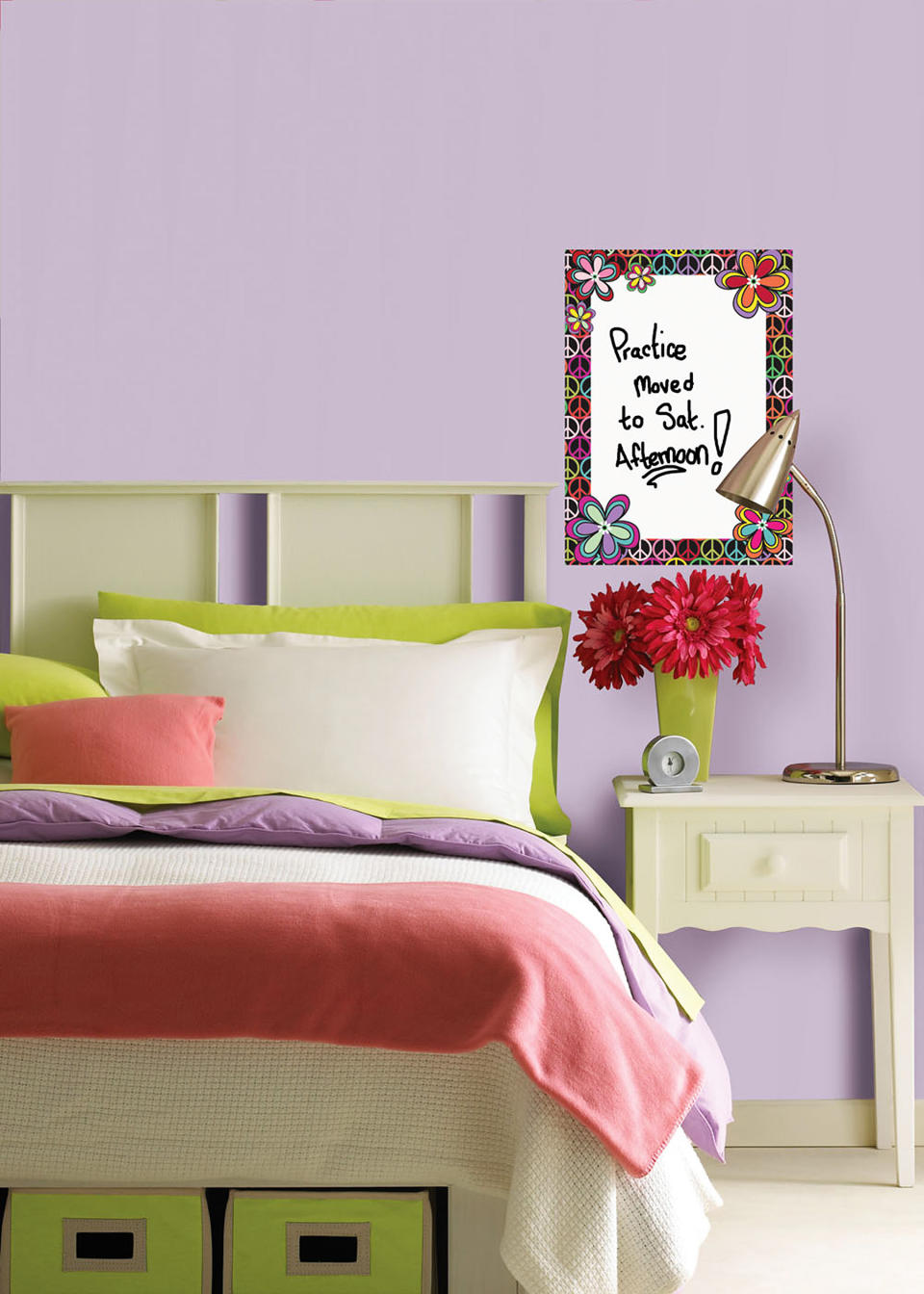 This publicity photo provided by courtesy of Brewster Home Fashions shows the WallPops Peace Dry-Erase Message Board decal that can help a student keep track of appointments or a bedtime checklist of responsibilities. (AP Photo/Brewster Home Fashions)