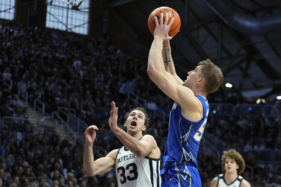 Creighton's Baylor Scheierman (55) shoots over Butler's Boden Kapke (33) during the second half of an NCAA college basketball game, Saturday, Feb. 17, 2024, in Indianapolis. (AP Photo/Darron Cummings)