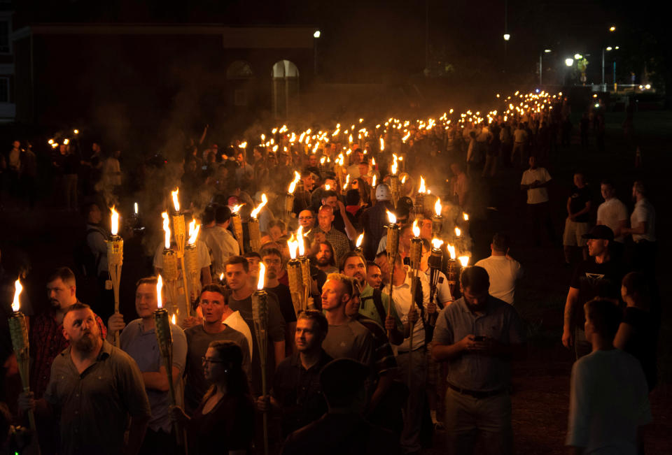 <p>White nationalists carry torches on the grounds of the University of Virginia, on the eve of a planned Unite The Right rally in Charlottesville, Va., Aug. 11, 2017. (Photo: Alejandro Alvarez/News2Share via Reuters) </p>