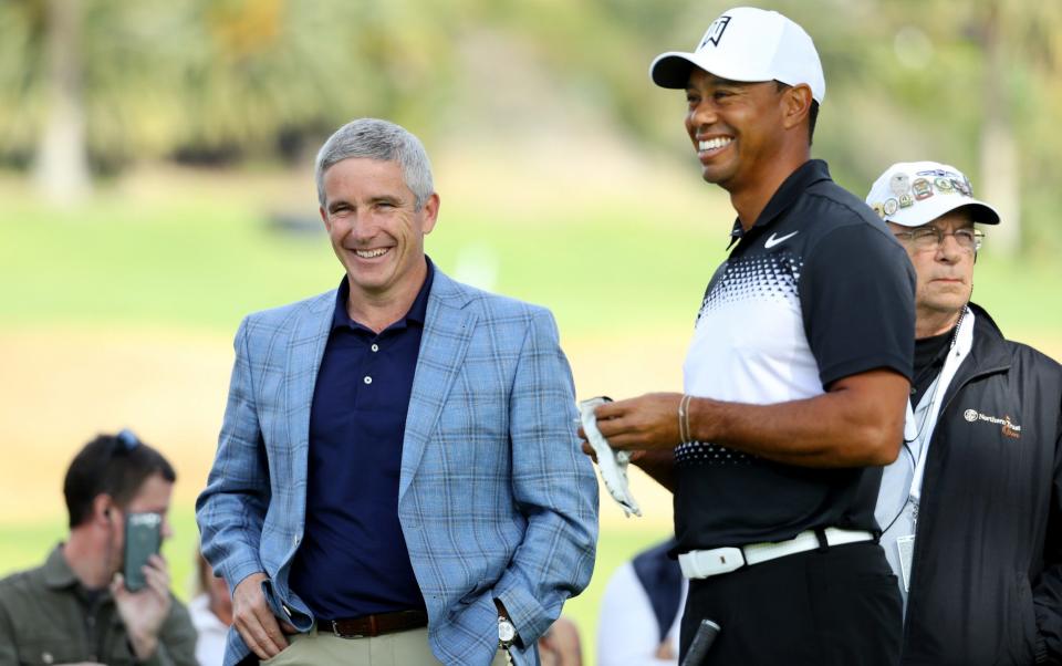 Jay Monahan (L) meets with Tiger Woods - Warren Little/Getty Images