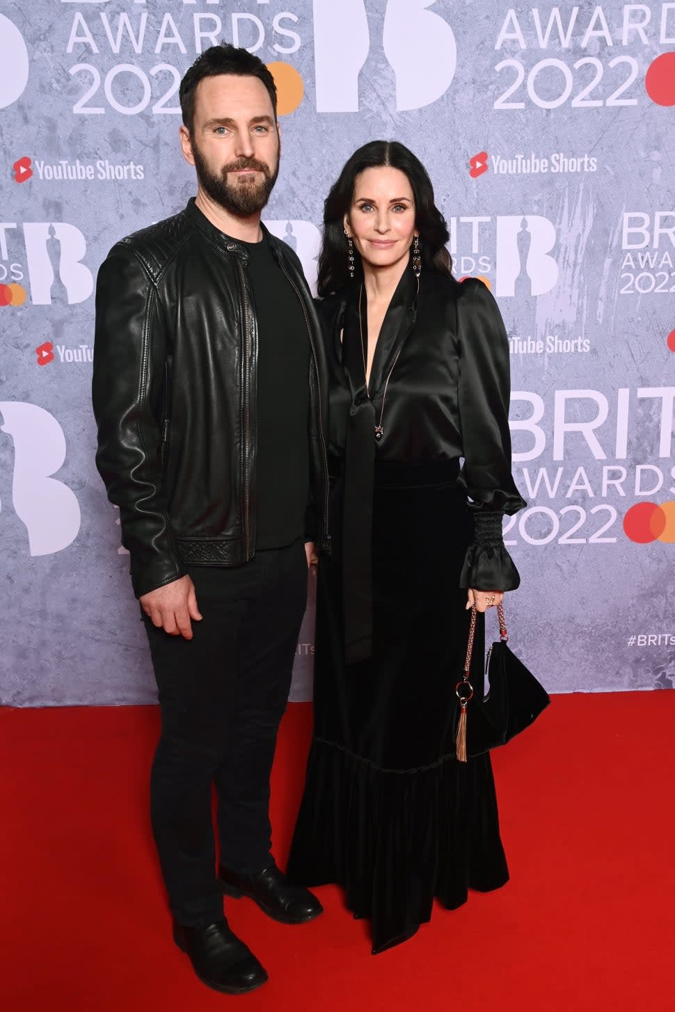 Johnny McDaid and Courteney Cox attend The BRIT Awards 2022 at The O2 Arena on February 08, 2022 in London, England. 