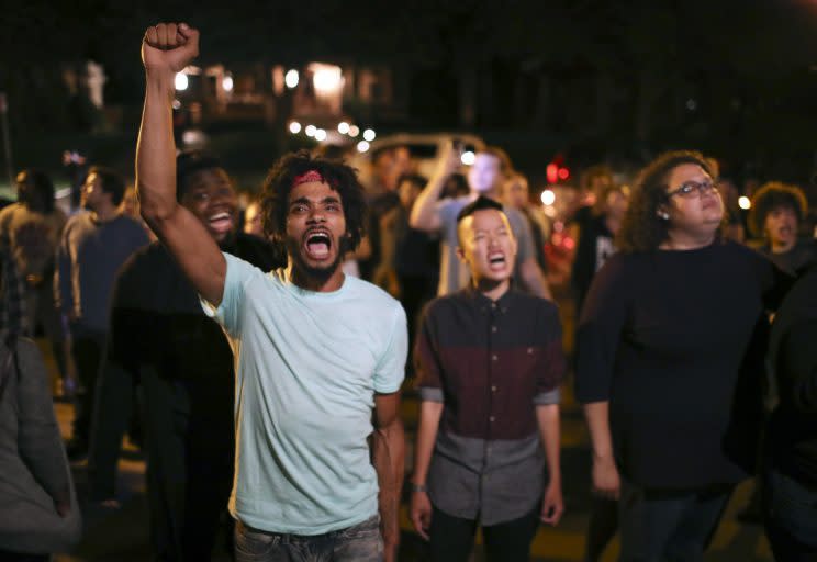 Angry demonstrators chant as they block Summit Avenue in front of the governor's residence in St. Paul, Minn., early Thursday morning. (Photo: Jeff Wheeler/Star Tribune via AP)