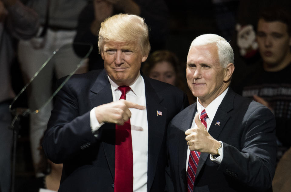 President-elect Donald Trump and Vice President-elect Mike Pence stand onstage together at U.S. Bank Arena on December 1, 2016 in Cincinnati, Ohio.  (Photo by Ty Wright/Getty Images)