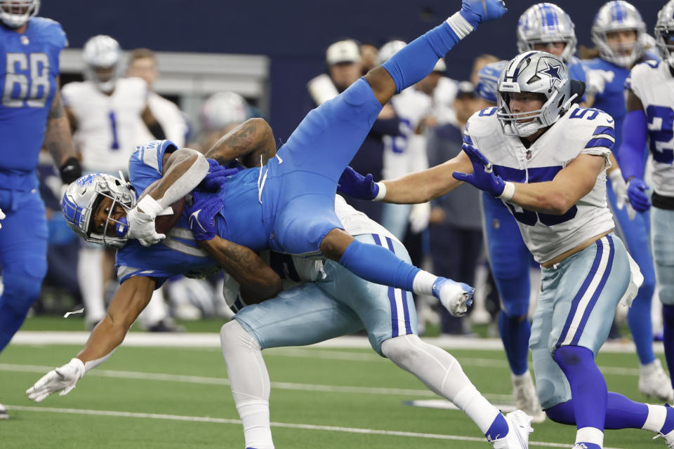 Detroit Lions running back Justin Jackson is tackled by Dallas Cowboys defensive end Sam Williams during the second half of an NFL football game, Sunday, Oct. 23, 2022, in Arlington, Texas. (AP Photo/Roger Steinman)