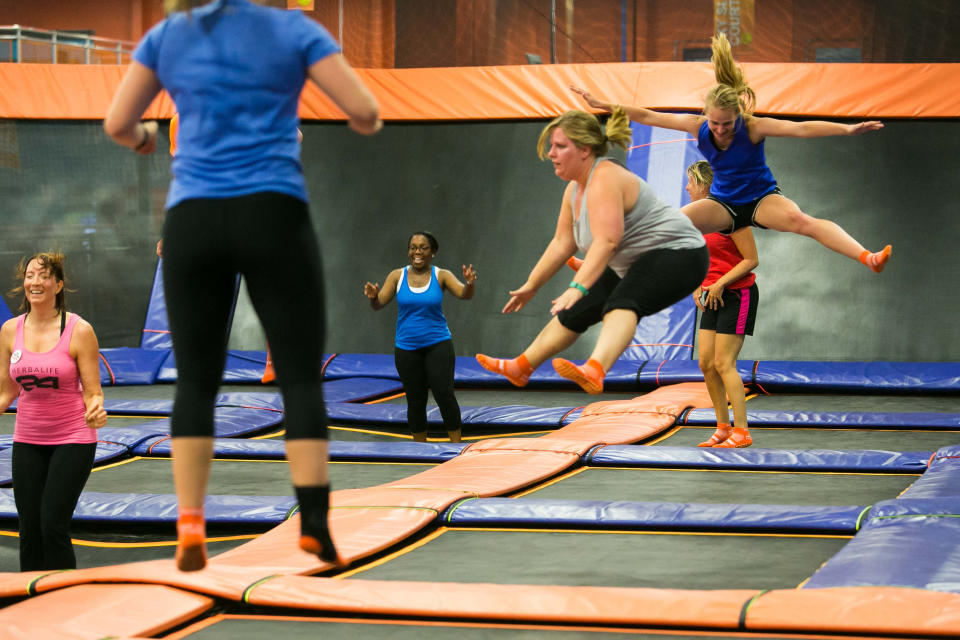 People of all ages enjoy the trampoline fitness class at Sky Zone in Newark.