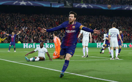 Soccer Football - Champions League Round of 16 Second Leg - FC Barcelona vs Chelsea - Camp Nou, Barcelona, Spain - March 14, 2018 Barcelona’s Lionel Messi celebrates scoring their third goal REUTERS/Albert Gea