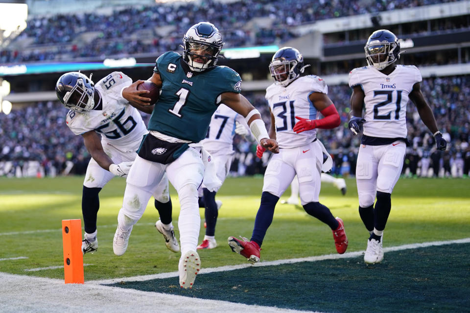 Philadelphia Eagles' Jalen Hurts scores a touchdown during the first half of an NFL football game against the Tennessee Titans, Sunday, Dec. 4, 2022, in Philadelphia. (AP Photo/Matt Rourke)