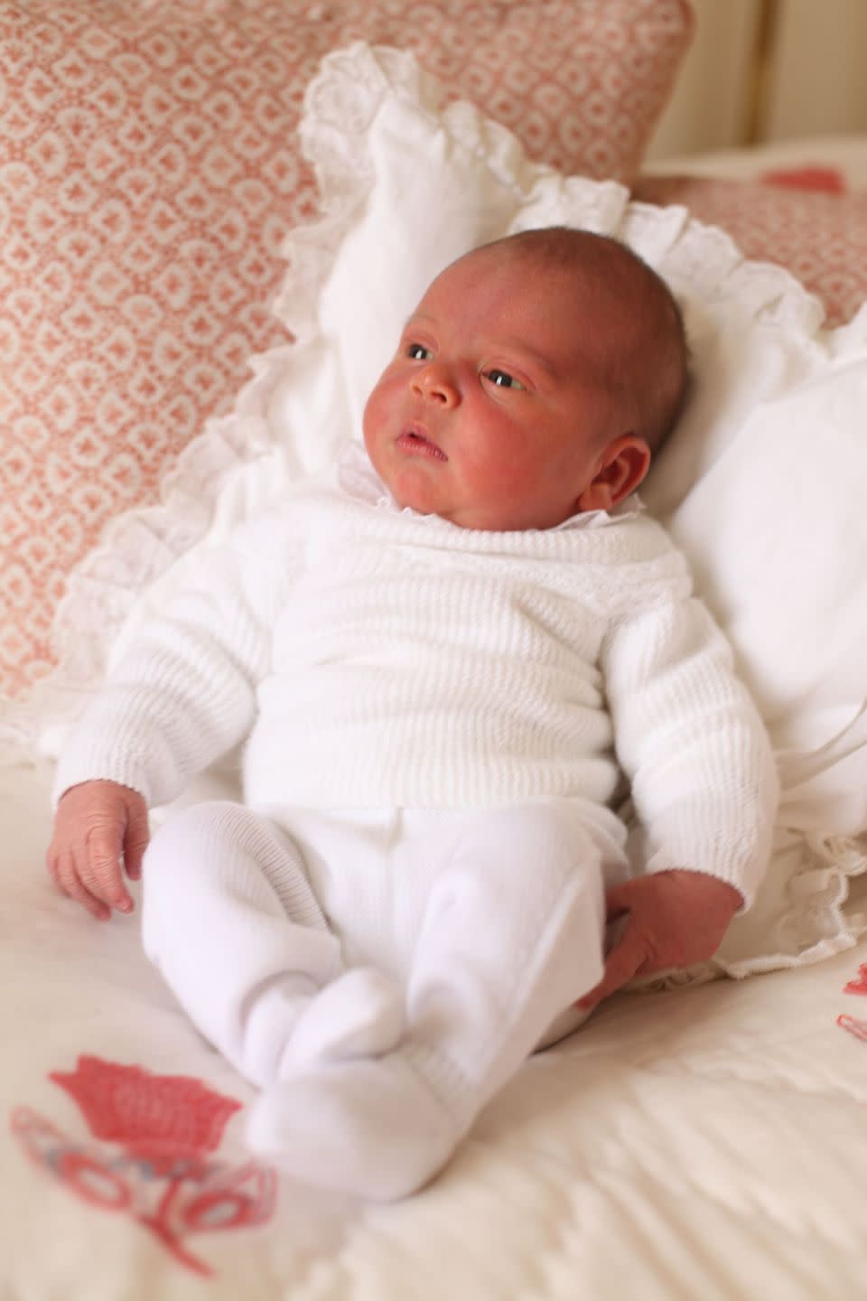 <p>Prince Louis made his public debut <a href="https://www.townandcountrymag.com/society/tradition/a26990385/prince-harry-meghan-markle-pose-hospital-royal-baby-history-photos/" rel="nofollow noopener" target="_blank" data-ylk="slk:on the Lindo Wing steps just hours after being born;elm:context_link;itc:0;sec:content-canvas" class="link ">on the Lindo Wing steps just hours after being born</a>, but the first official portraits of Will and Kate's third child were a bit more intimate. Kate photographed her newborn baby at home, at Kensington Palace. </p>