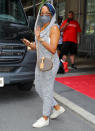 <p>Regina King waves as she leaves her hotel in N.Y.C. on Sept. 15.</p>