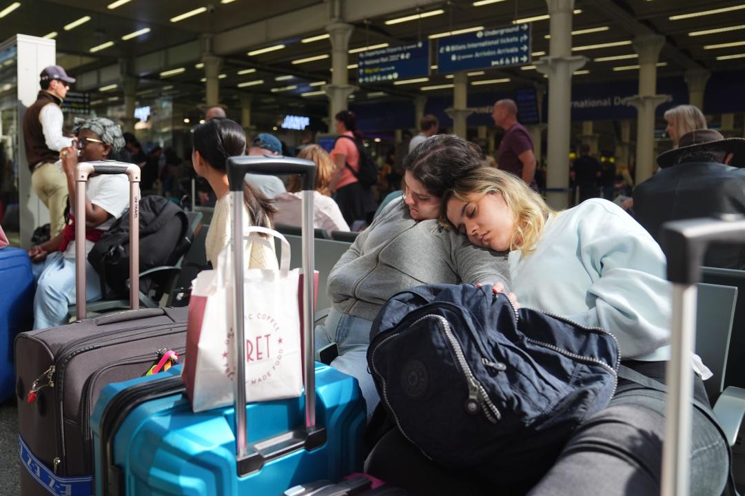 Passengers at the Eurostar terminal at St Pancras station in central London. French rail officials say several lines have been hit by 