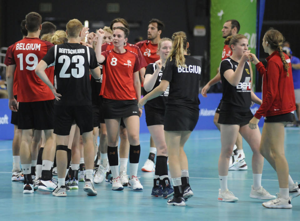 Korfball players from Germany and Belgium exchange fist bumps after competing at the The World Games in Birmingham, Ala., on Wednesday, July 13, 2022. The 11-day, Olympic-style competition is being held in the United States for only the second time, at venues throughout Birmingham, Ala. (AP Photo/Jay Reeves)