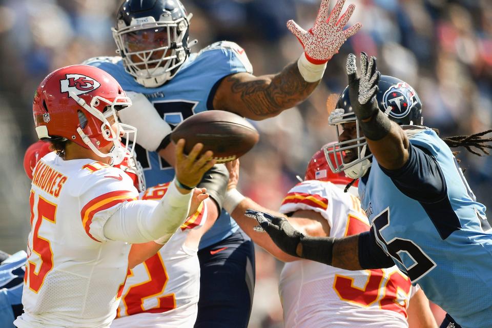 Titans defensive end Denico Autry pressures Chiefs quarterback Patrick Mahomes on Sunday.