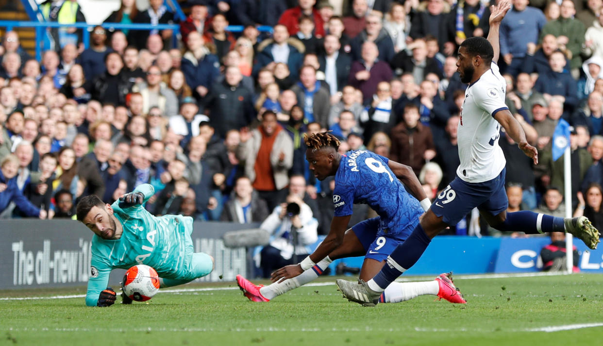 Tottenham goalkeeper Hugo Lloris makes a save from Chelsea's Tammy Abraham.