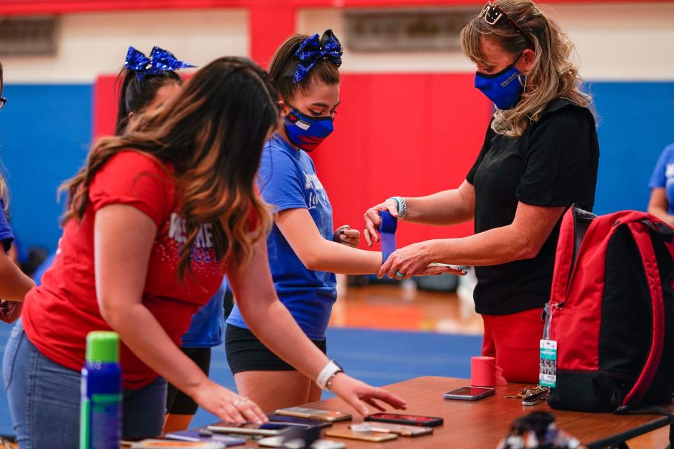 Stephanie Davy arrives at cheer team practice after school.