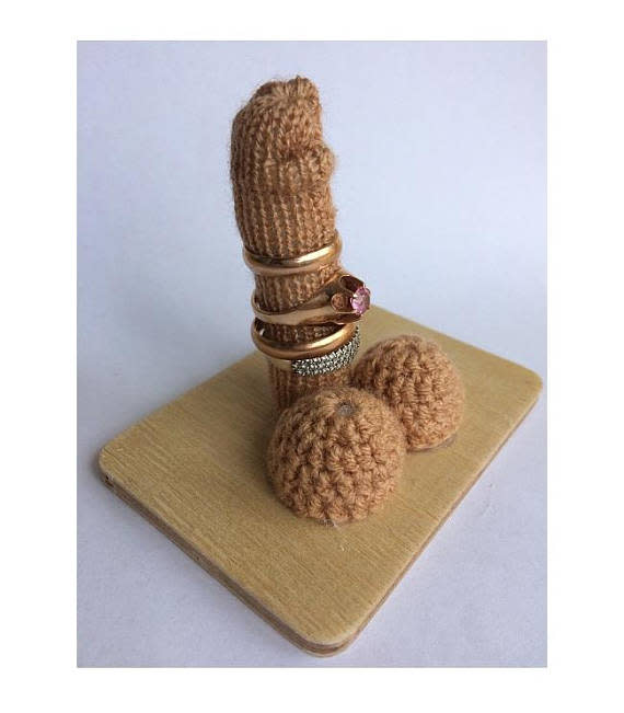 A penis ring holder