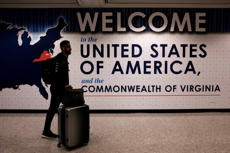 An international passenger arrives at Washington Dulles International Airport