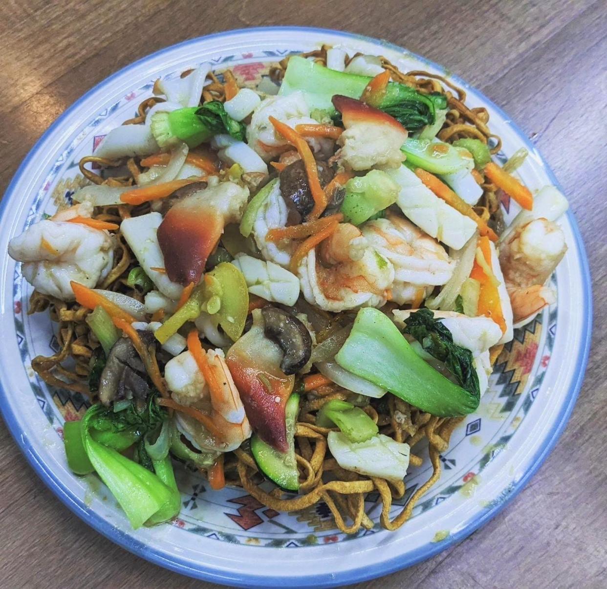 Seafood pan fried noodles from Wee's Cozy Kitchen at 2400 Rio Grande St.