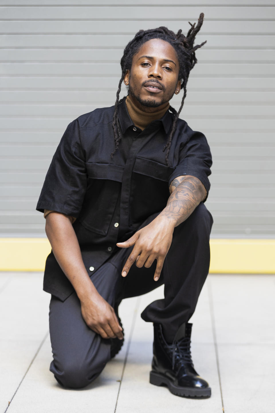 Rapper D Smoke poses for a portrait in Los Angeles on Saturday, Dec. 26, 2020. The rapper and school teacher is nominated for two Grammy Awards, one for best rap album for "Black Habits," and one for best new artist. The 63rd Annual Grammy Awards will be held on Sunday, March 14. (Willy Sanjuan/Invision/AP)