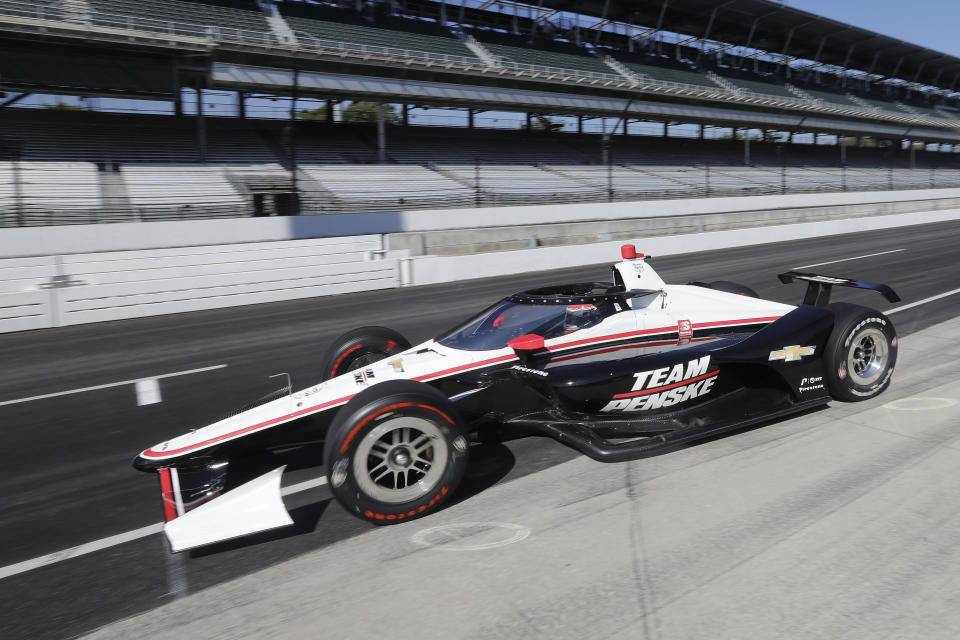 Will Power, of Australia, leaves the pits during the Aeroscreen testing at Indianapolis Motor Speedway, Wednesday, Oct. 2, 2019, in Indianapolis. (AP Photo/Darron Cummings)