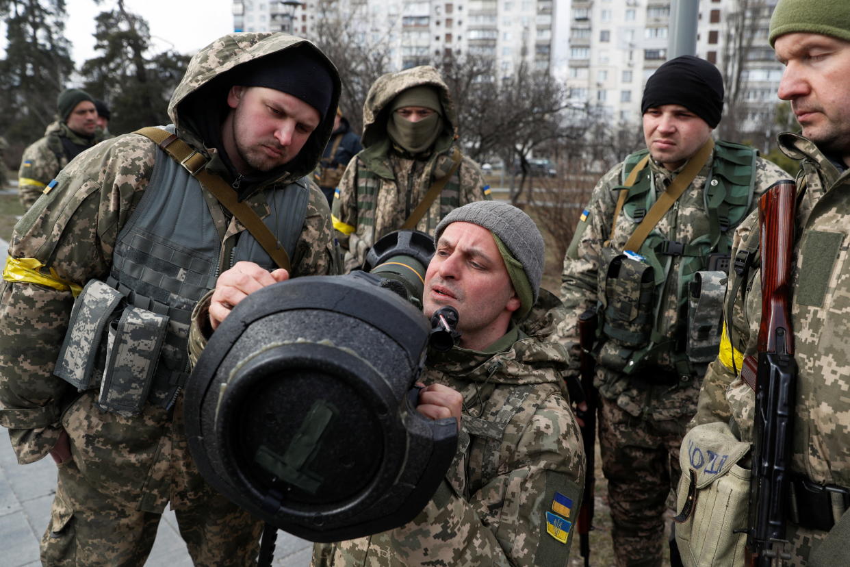 New members of the Territorial Defence Forces train to operate NLAW anti-tank launcher. (Reuters)