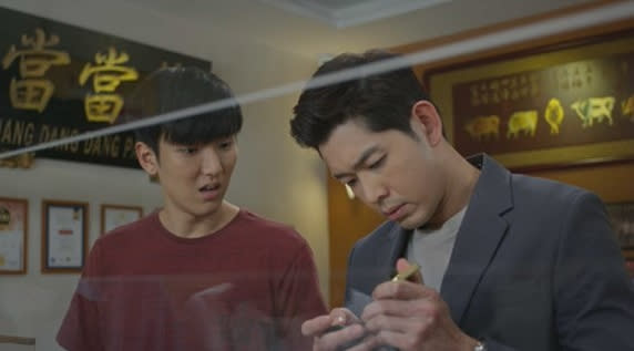 Zhai Si Ming and Romeo Tan in The Peculiar Pawnbroker. (Still: Mediacorp)