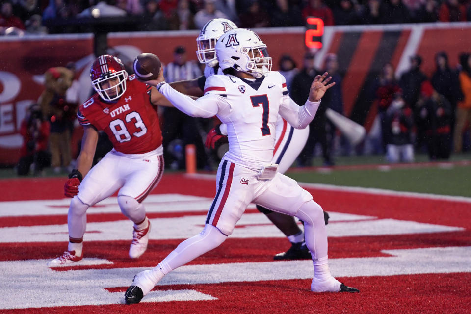 Arizona quarterback Jayden de Laura (7) throws against Utah during the first half of an NCAA college football game Saturday, Nov. 5, 2022, in Salt Lake City. (AP Photo/Rick Bowmer)