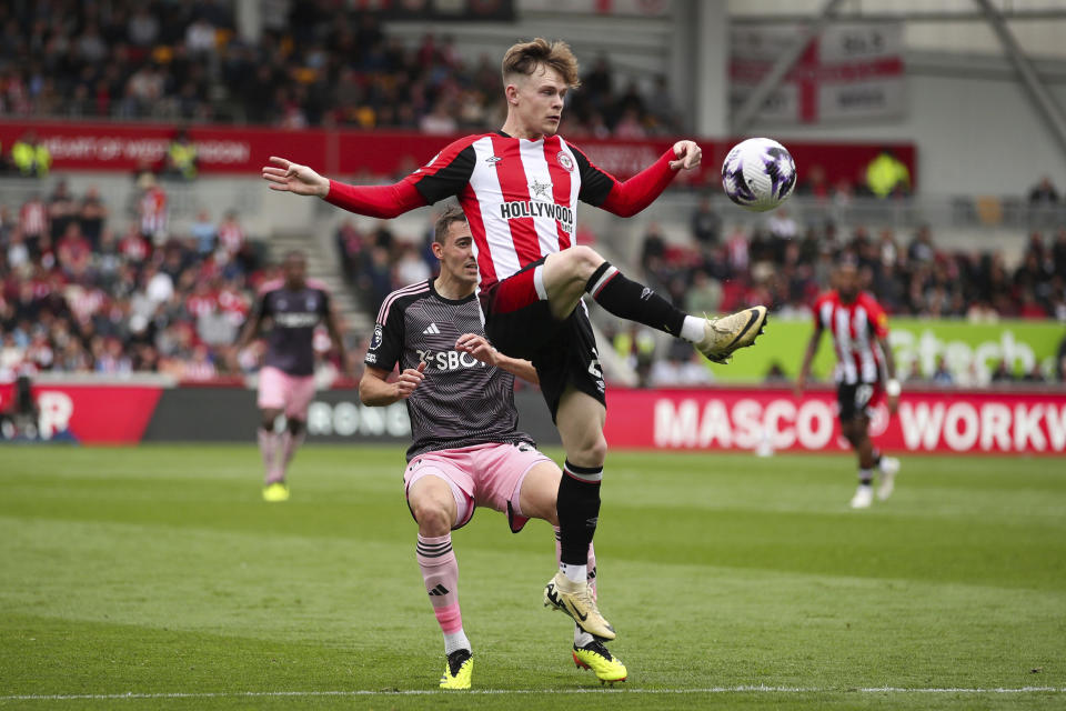 Brentford's Keane Lewis-Potter controls the ball during the English Premier League soccer match between Fulham FC and Brentford FC at the Gtech Community Stadium in London, Saturday May 4, 2024. (Rhianna Chadwick/PA via AP)