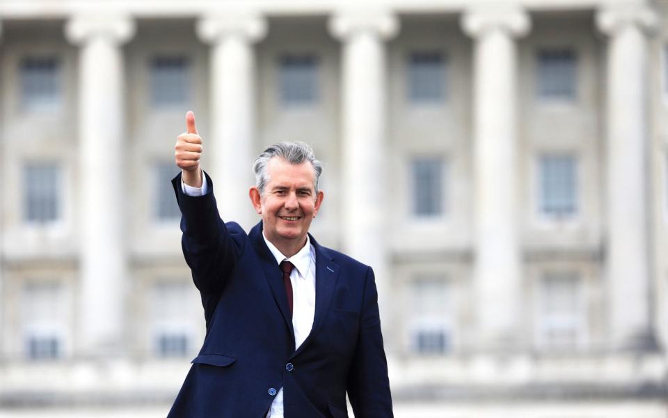 Edwin Poots gives the thumbs up outside Parliament buildings after being elected as the new party leader on May 14 - Peter Morrison/AP