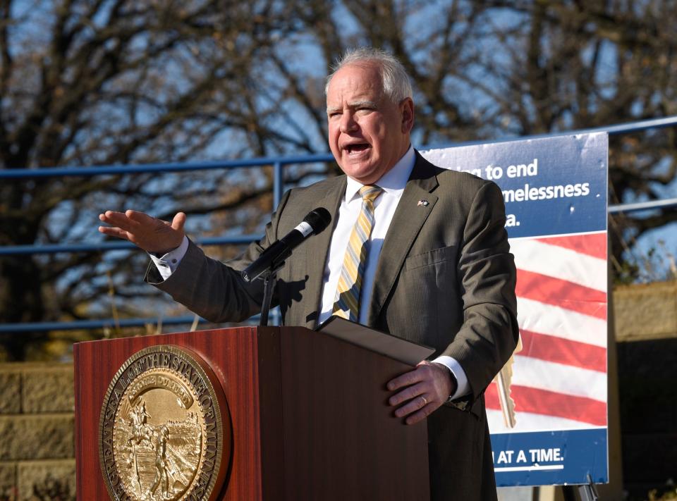 Minnesota Governor Tim Walz speaks at a ceremony declaring the end of veteran homelessness by the Central Minnesota Continuum of Care Tuesday, Nov. 9, 2021, at Veterans Plaza in St. Cloud.