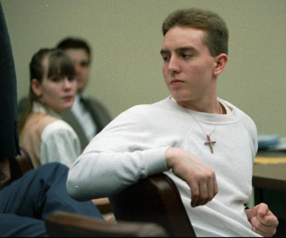Martin Puccio looks back at the door as he awaits the judge during a pre-trial hearing on Friday, Sept. 7, 1994.