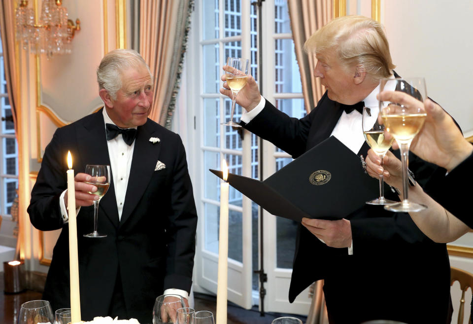 FILE - President Donald Trump and Britain's Prince Charles toast, during the Return Dinner in Winfield House, the residence of the Ambassador of the United States of America to the UK, in Regent's Park, part of the president's state visit to the UK, in London, June 4, 2019. (Chris Jackson/Pool Photo via AP, File)