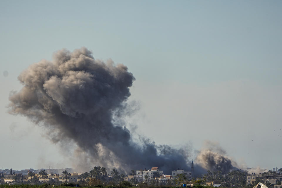 Smoke and explosion following an Israeli bombardment inside the Gaza Strip, as seen from southern Israel, Sunday, Feb. 11, 2024. The army is battling Palestinian militants across Gaza in the war ignited by Hamas' Oct. 7 attack into Israel. (AP Photo/Ariel Schalit)